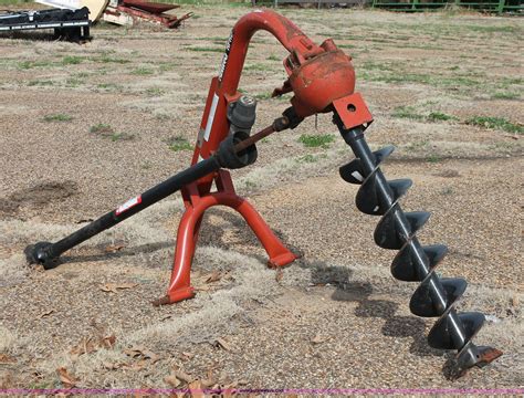 tractor post hole digger used